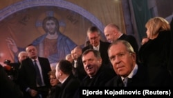 Russian Foreign Minister Sergei Lavrov (right) and Republika Srpska President Milorad Dodik (second right) at the St. Sava Temple in Belgrade on February 22.