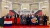 Delegații la conferința de fondare a unei „ligi internaționale a anti-globalistilor” numită Paladins, la Sankt Petersburg, Rusia.