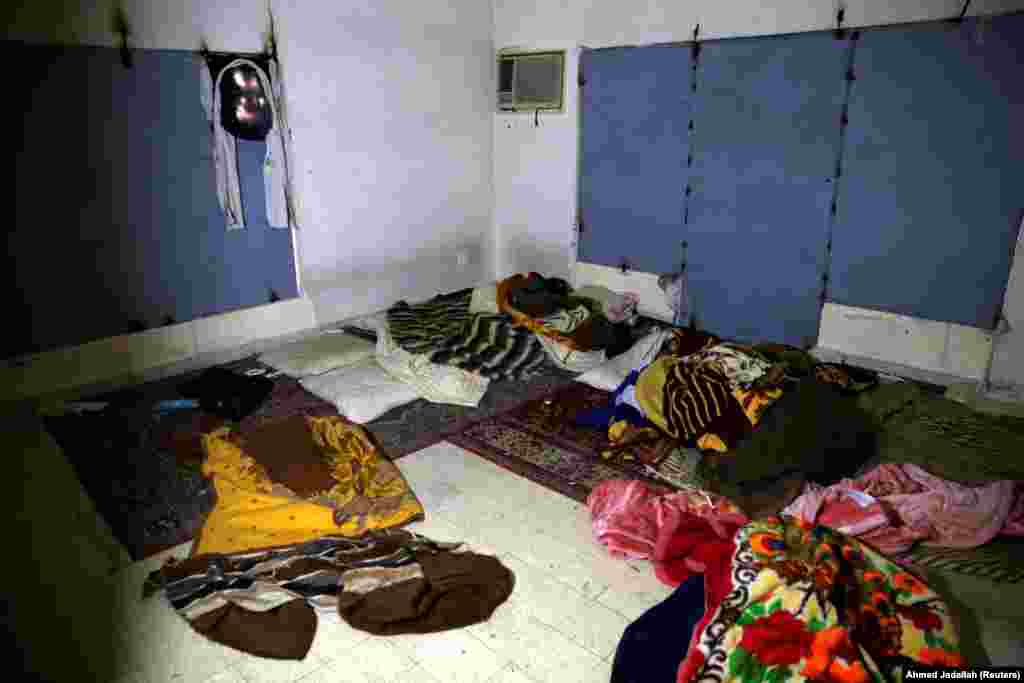 Blankets and sealed windows at a location in Mosul, Iraq, used by IS militants as a women's prison.