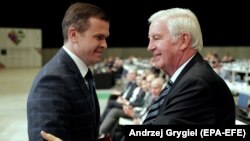 Craig Reedie (right) will be replaced at the start of the new year by former Polish Sports Minister Witold Banka (left).