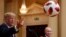 FINLAND -- U.S. President Donald Trump throws a football to U.S. First Lady Melania Trump during a joint news conference with Russia's President Vladimir Putin after their meeting in Helsinki, Finland, July 16, 2018. 