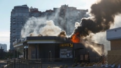 The aftermath of a Russian drone strike on a gas station in Kyiv on September 15.