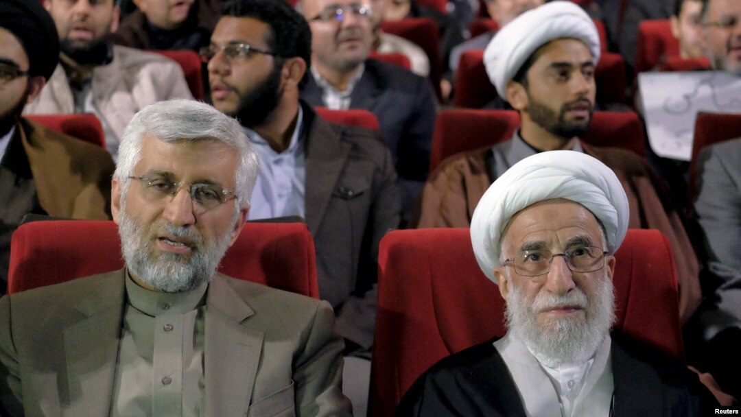 آیت‌الله احمد جنتی، دبیر شورای نگهبان همراه با سعید جلیلی، نماینده رهبر در شورای عالی امنیت ملی.