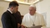 Pope Francis (right) meets with Ukrainian President Volodymyr Zelenskiy during a private audience at the Vatican in February 2020.