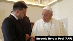 Pope Francis (right) meets with Ukrainian President Volodymyr Zelenskiy during a private audience at the Vatican in February 2020.
