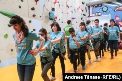 A group of visually impaired children during a session at the Climb Again center