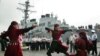 Georgian artists welcome the "USS Stout" in Georgia's Black Sea port of Batumi.