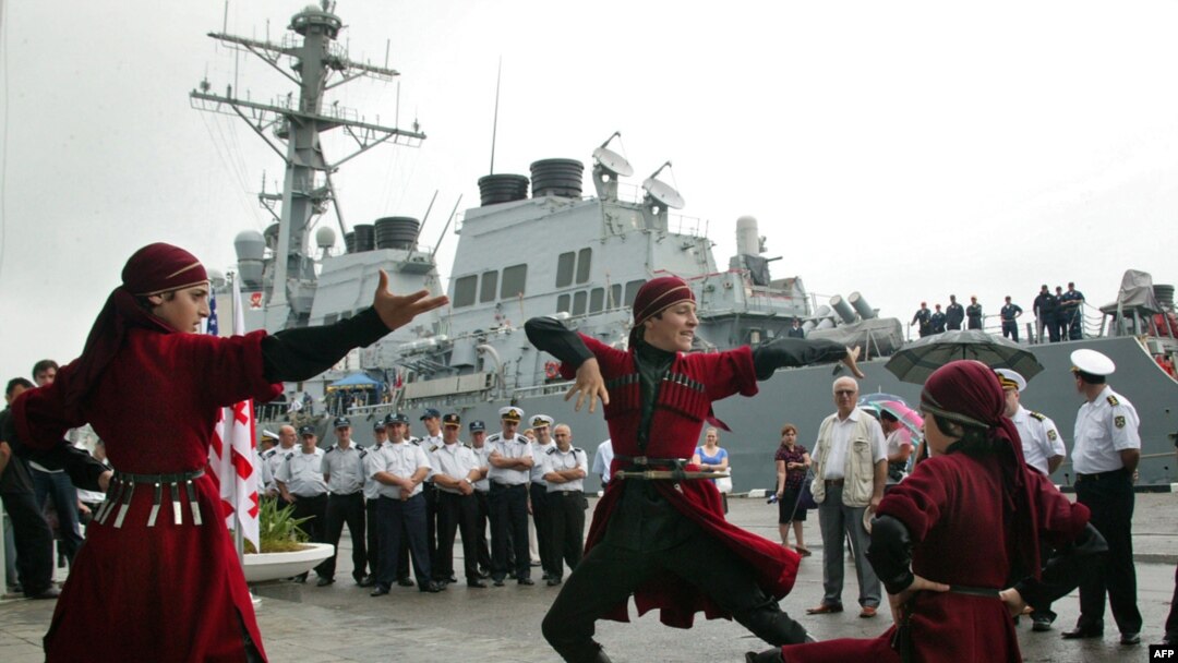Georgian artists welcome the "USS Stout" in Georgia's Black Sea port of Batumi.