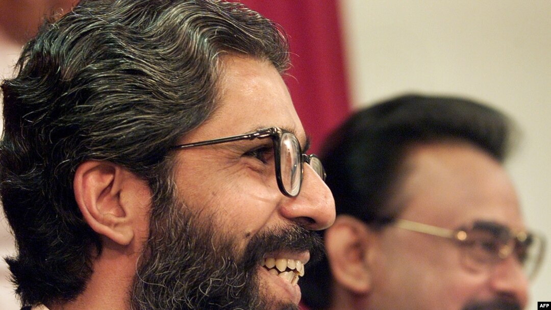 Pakistani Muttahida Quami Movement (MQM) Secretary-General Imran Farooq (left) in London in September 1999