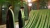 Iranian supreme leader Ayatollah Ali Khamenei (C) and Khomeini's grandson Hassan Khomeini (L) pray inside the shrine of late Iranian Supreme Leader Ayatollah Ruhollah Khomeini. FILE PHOTO
