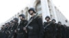 Kyrgyz security forces in Bishkek stand in formation during preparations for heightened security measures ahead of a presidential election in the Central Asian country in 2011. 