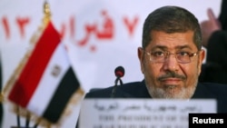 Egyptian President Muhammad Morsi at the OIC summit in Cairo on February 6