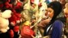 Girl checking Valentines Day gifts at a shop in Tehran. FILE PHOTO.