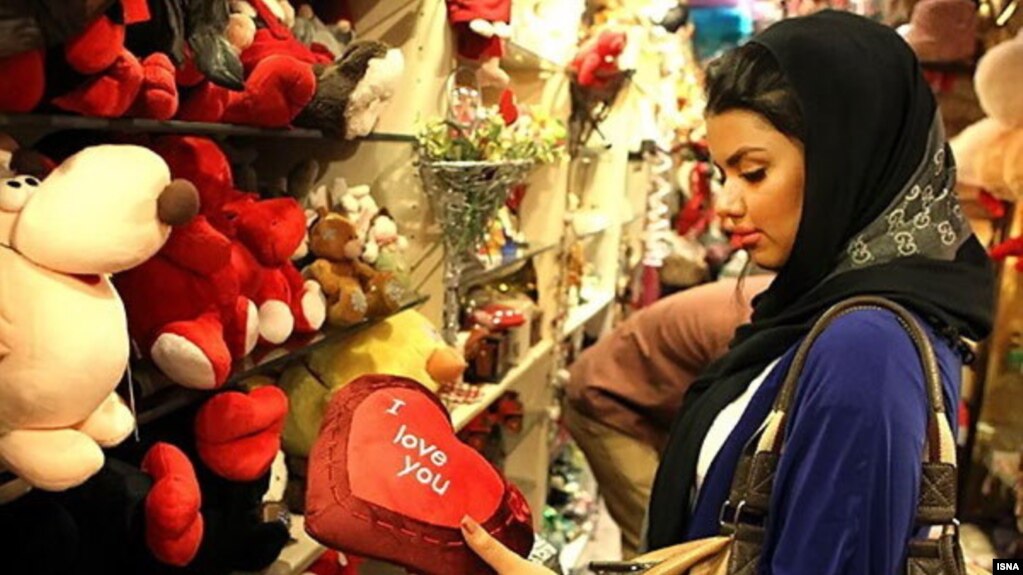 Girl checking Valentines Day gifts at a shop in Tehran. FILE PHOTO.