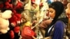 Girl checking Valentines Day gifts at a shop in Tehran. FILE PHOTO.