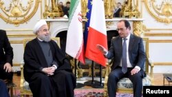 Президенты Ирана и ФРанции - Хасан Рухани и Франсуа Олланд (Париж, 28 января 2016 года)