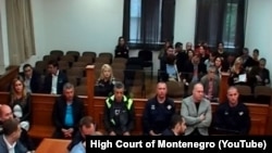 Personat e përfshirë në rastin "Grusht shteti" gjatë një paraqitjeje në Gjykatën e Lartë të Malit të Zi.
