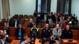 Personat e përfshirë në rastin "Grusht shteti" gjatë një paraqitjeje në Gjykatën e Lartë të Malit të Zi.
