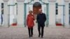 German Chancellor Olaf Scholz and European Commission President Ursula von der Leyen walk following a closed German cabinet meeting at the government's guest house in Schloss Meseberg, near Gransee, Germany, on March 5.