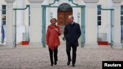 German Chancellor Olaf Scholz and European Commission President Ursula von der Leyen walk following a closed German cabinet meeting at the government's guest house in Schloss Meseberg, near Gransee, Germany, on March 5.