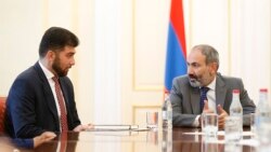 Armenia -- Prime Minister Nikol Pashinian (R) introduces Davit Sanasarian, the newly appointed head of the State Oversight Service (SOS), to SOS staff, Yerevan, May 29, 2018.