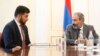 Armenia -- Prime Minister Nikol Pashinian (R) introduces Davit Sanasarian, the newly appointed head of the State Oversight Service (SOS), to SOS staff, Yerevan, May 29, 2018.