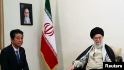 IRAN -- Iran's Supreme Leader Ayatollah Ali Khamenei meets with Japan's Prime Minister Shinzo Abe in Tehran, Iran June 13, 2019