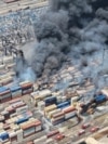 Smoke rises after a massive explosion and fire rocked a port near the southern port city of Bandar Abbas, Iran, on April 26.
