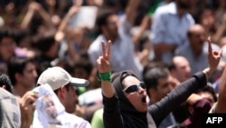 Tens of thousands of opposition supporters rallied outside Tehran University during Friday Prayers on July 17.