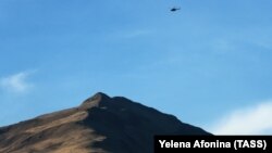 A helicopter flies during a search-and-rescue operation on March 7.