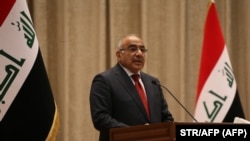 Iraq -- Adel Abdul Mahdi, the new prime minister, addresses the Iraqi parliament during the vote on the new government, October 24, 3018 in Baghdad. - The Iraqi parliament on Thursday approved 14 new cabinet ministers proposed by prime minister-designate 