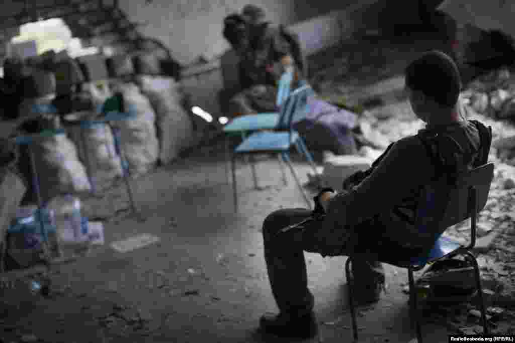 An exhausted fighter rests between clashes.