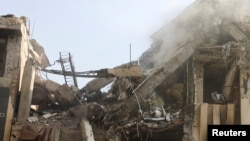 The aftermath of Israeli strikes in Tehran on June 13