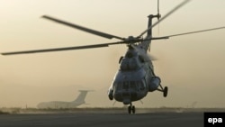 Afghanistan -- A civilian helicopter of the type Mi-8, made in Russia, flies north of Khost, undated