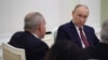 Russian President Vladimir Putin (right) meets Armenian Prime Minister Nikol Pashinian at the Kremlin on April 1.