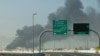 În imagine, nor de fum în zona portului Jebel Ali, la 35 de kilometri de Dubai, în urma unui atac irnian în zonă. 