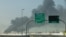 În imagine, nor de fum în zona portului Jebel Ali, la 35 de kilometri de Dubai, în urma unui atac irnian în zonă. 