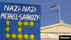 A banner in front of the Greek parliament during a rally against austerity measures in Athens 
