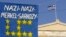 Банер біля грецького парламенту у Афінах, 19 червня 2011 року
