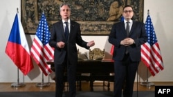 U.S. Secretary of State Antony Blinken (left) and Czech Foreign Minister Jan Lipavsky speak to the media before signing an agreement ahead of the NATO meeting in Prague on May 30.