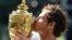 Andy Murray of Britain kisses the championship trophy after winning the Wimbledon Championships at the All England Lawn Tennis Club, in London in 2016.