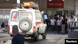 An ambulance arrives at a hospital in Beirut on September 17 after simultaneous pager explosions in Lebanon. 