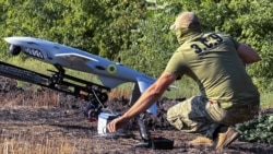 UKRAINE – A serviceman of the Unmanned Systems Battalion 'Ronin' of the 65th Motorized Rifle Brigade operates prepares drone to launch it towards Russian positions in the Zaporizhzhia region, 29 August 2026