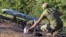 UKRAINE – A serviceman of the Unmanned Systems Battalion 'Ronin' of the 65th Motorized Rifle Brigade operates prepares drone to launch it towards Russian positions in the Zaporizhzhia region, 29 August 2026