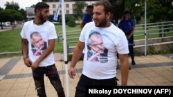 Supporters wearing T-shirts with pictures of former Bulgarian Prime Minister Boyko Borisov await a preelection rally in the city of Kardzhali on July 5.