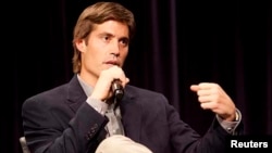 U.S. journalist James Foley speaks at Northwestern University's Medill School of Journalism, Media, Integrated Marketing Communications in Evanston, Illinois, after being released from imprisonment in Libya, in this 2011 handout photo.