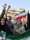 People in Tehran attend a protest against the US attack on Iranian nuclear sites amid the Iran-Israel conflict. 