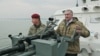 Российский глава Крыма Сергей Аксенов (справа) вместе с руководителем Росгвардии Виктором Золотовым на патрульном катере «Грачонок» в Керченском проливе, 27 ноября 2019 года 