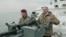 Российский глава Крыма Сергей Аксенов (справа) вместе с руководителем Росгвардии Виктором Золотовым на патрульном катере «Грачонок» в Керченском проливе, 27 ноября 2019 года 