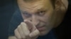 News Analysis: Twists In Navalny Case Leave Heads Spinning
